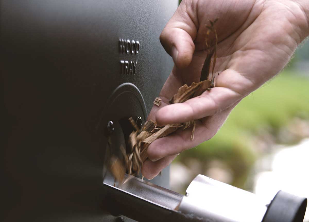 Patented side wood chip loading system – add wood chips without opening door.